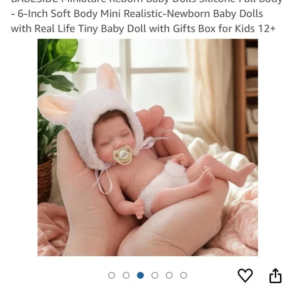 Adorable Reborn Baby Doll with Brown Hair and Cream Outfit - Picture 3 of 10